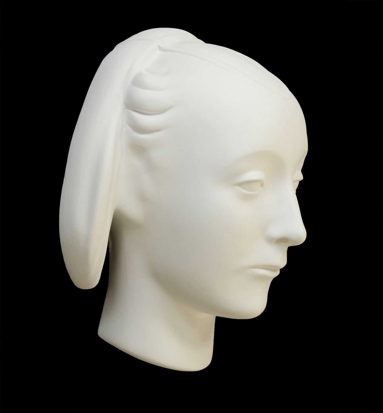 photo of white plaster cast sculpture mask of female with part-back hairdo against gray background