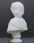 photo of white plaster cast bust sculpture of young woman with headband piece and in dress that falls off shoulders against a gray background