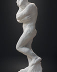 photo of white plaster cast sculpture of nude female figure hugging herself against gray background