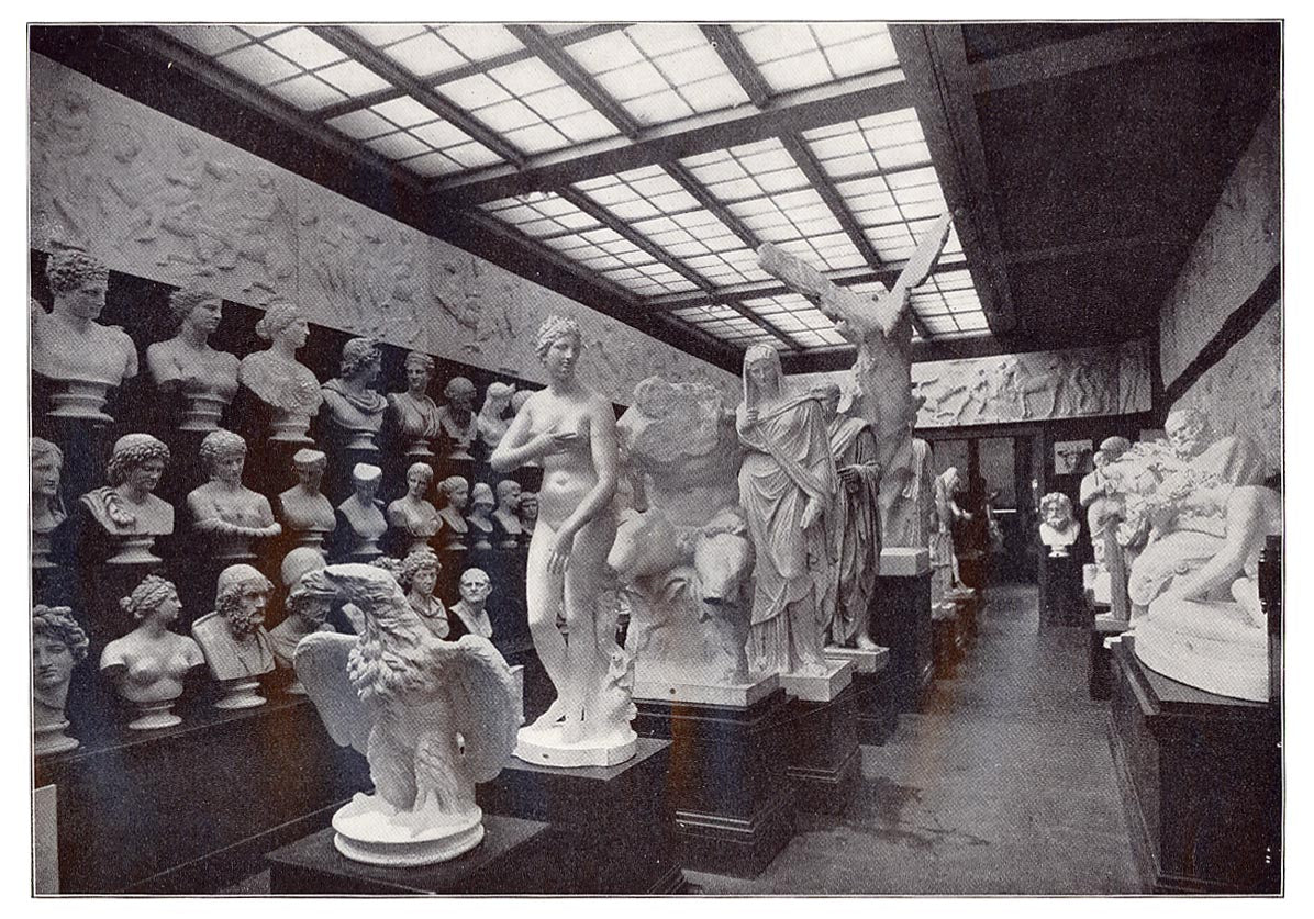 black and white photo of gallery of plaster cast sculpture reproductions in the early 1900s