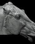 photo of plaster cast sculpture of horse's head with open mouth