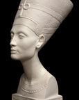 photo of plaster cast sculpture of bust of Nefertiti with crown and decorative collar on a decorative base with a black background