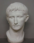 photo of plaster cast bust of man, namely Augustus Caesar, with gray background