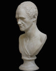 photo with black background of plaster cast bust of Alexander Hamilton