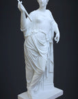 photo of plaster cast sculpture of female figure in robes leaning on podium