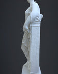 photo of plaster cast sculpture of female figure in robes leaning on podium