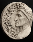 photo of plaster cast of small medallion with male portrait, namely Dante Alighieri, in profile and floral decoration on the left side curve and the word Dante, on black background