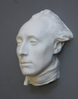 photo with gray background of plaster cast of male face, namely Lafayette, with neckerchief