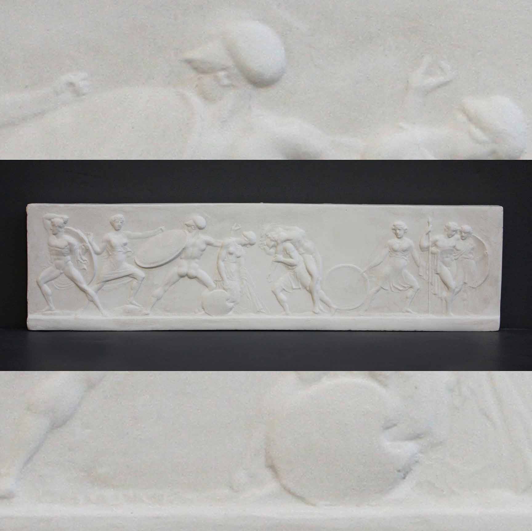 photo of plaster cast of small ancient relief with figures with a background of the same image zoomed-in