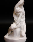 Photo of plaster cast sculpture of flayed man kneeling with hands on head on black background