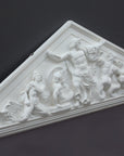 photo of white triangular plaster cast sculpture relief of the god Zeus in the center and the Giants around him on a gray background