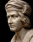 photo of plaster cast sculpture bust of man, namely Christopher Columbus, in robes and hat with black background