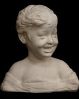 photo of white plaster cast sculpture bust of boy with open mouth, laughing, short hair, and clothes below his shoulders against a black background